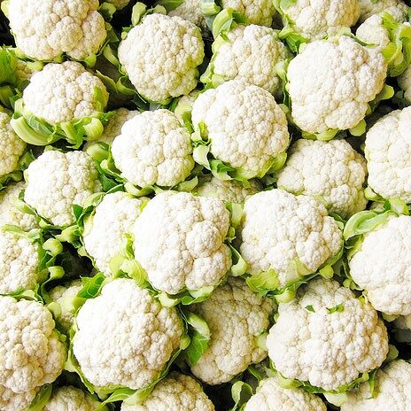 Bin of Cauliflower Heads.